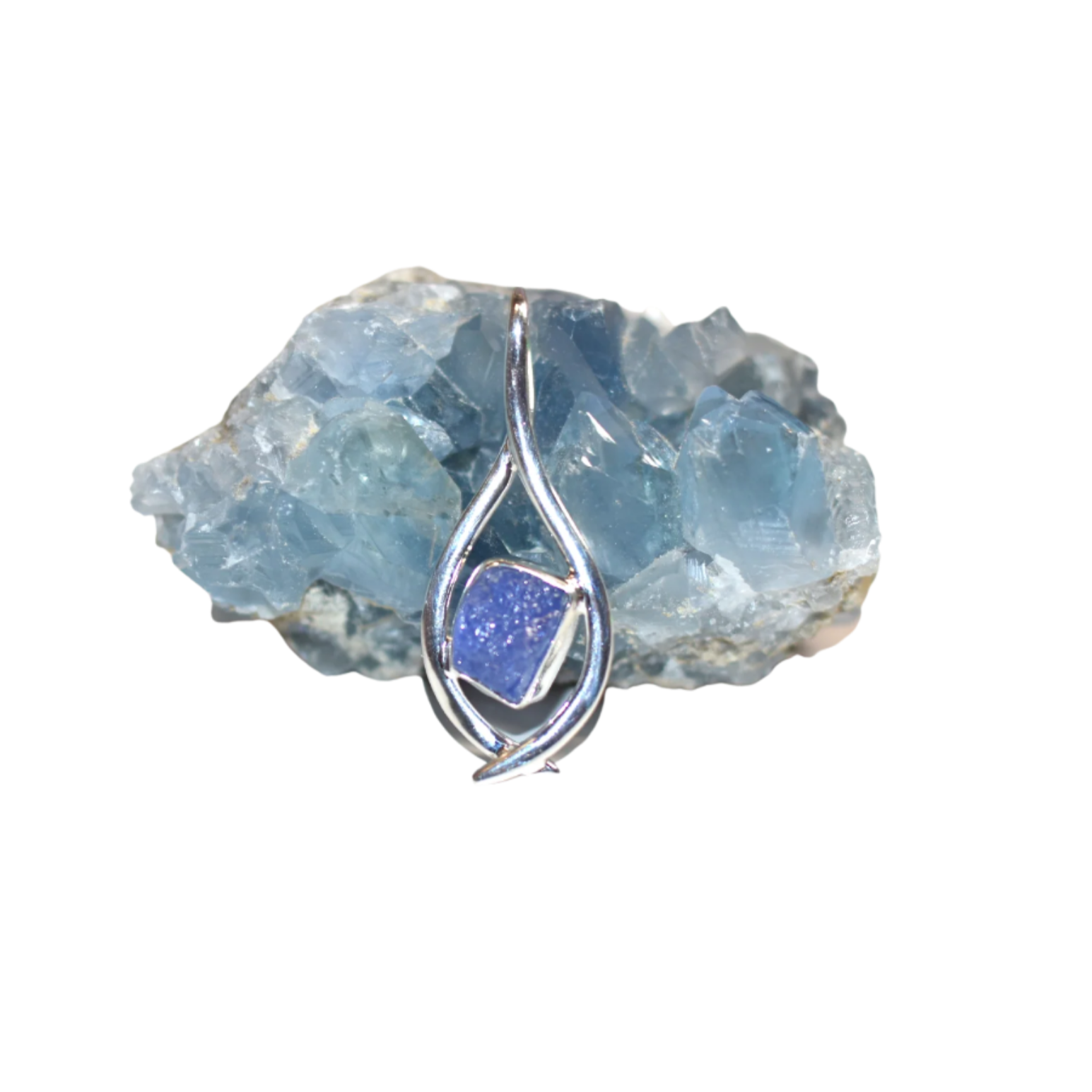 A sterling silver pendant featuring a blue tanzanite gemstone with a visible blue moonstone layer in the background.