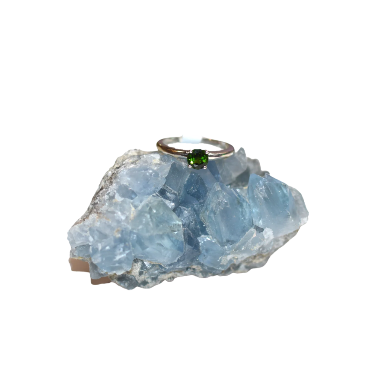 A Sterling Silver Chrome Diopside Ring with a deep green gemstone centerpiece.