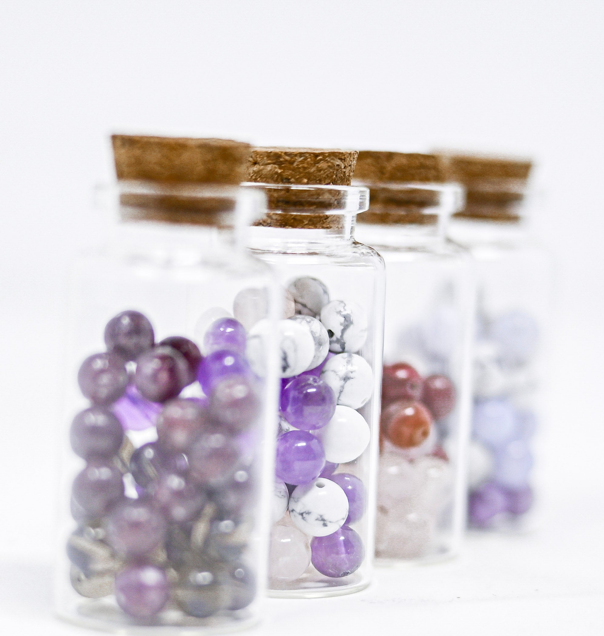 Actual colorful corked Crystalis Power Vials lined up together